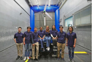 group shot of team in blue shirts