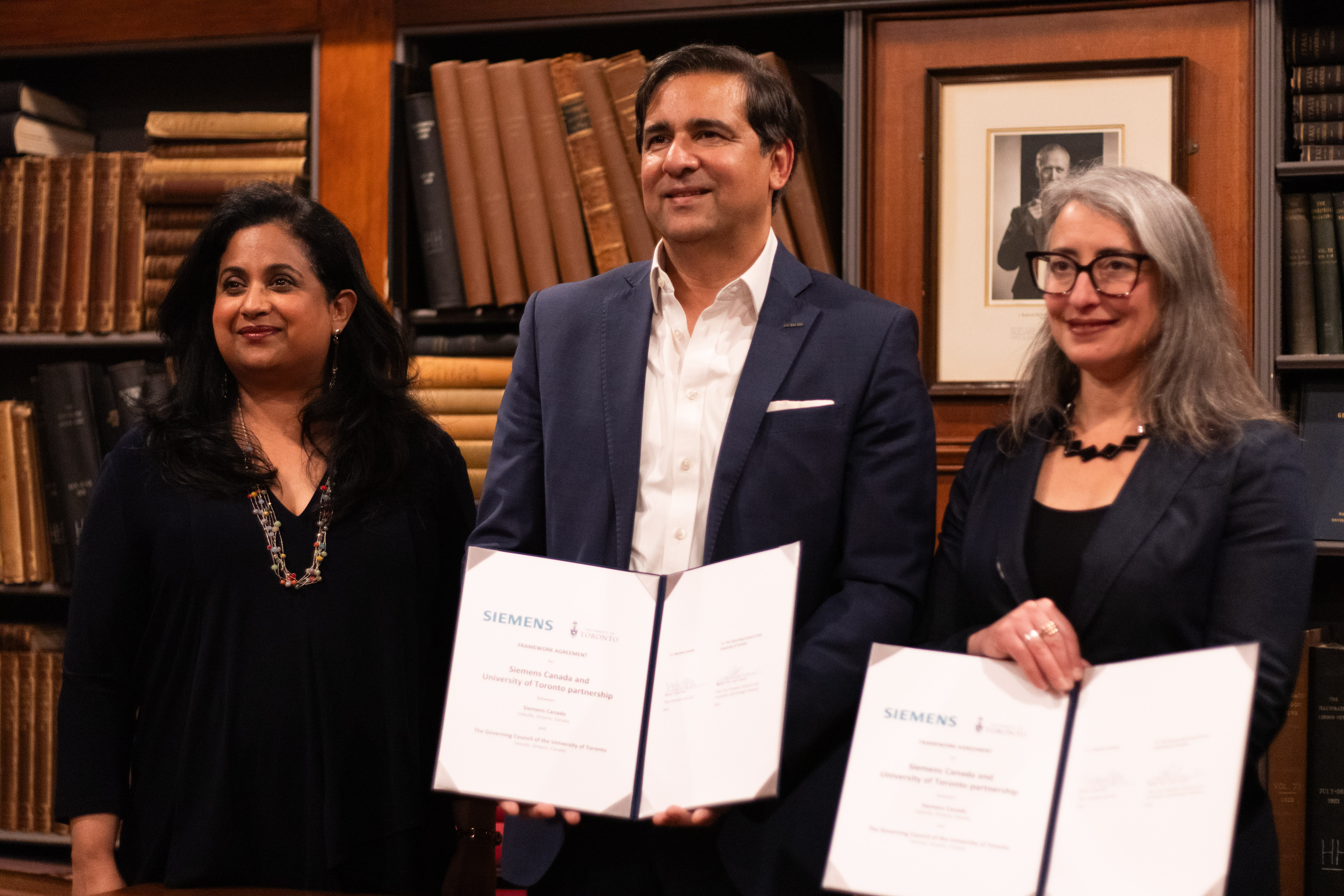 ECE Department Chair Deepa Kundur (Left), Siemens Canada CEO and President Faisal Kazi, and Leah Cowen (Right), U of T's vice-president, research and innovation, and strategic initiatives, after signing an institutional partnership agreement focused on advancing sustainability energy systems.