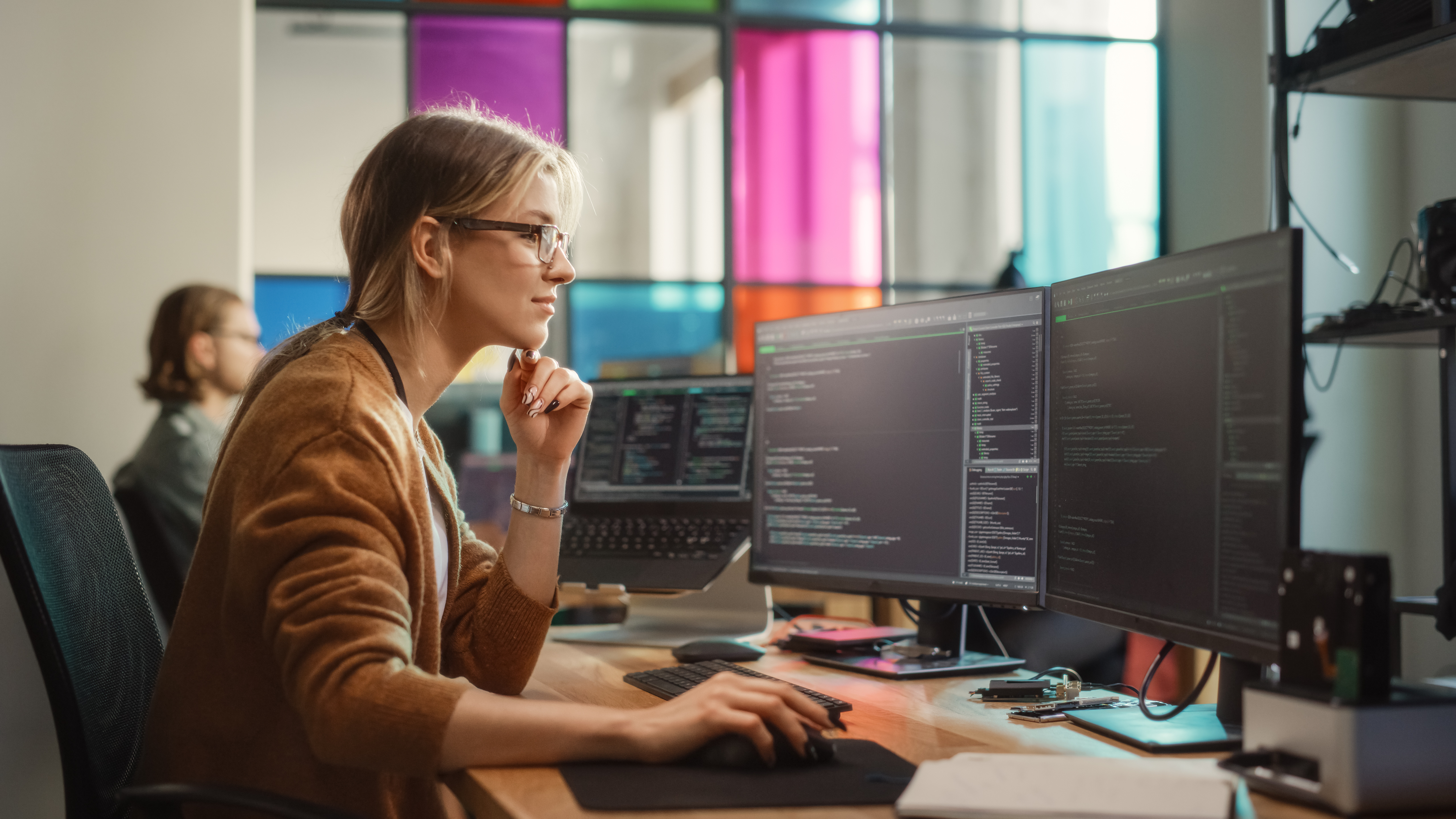 female engineer works at computer